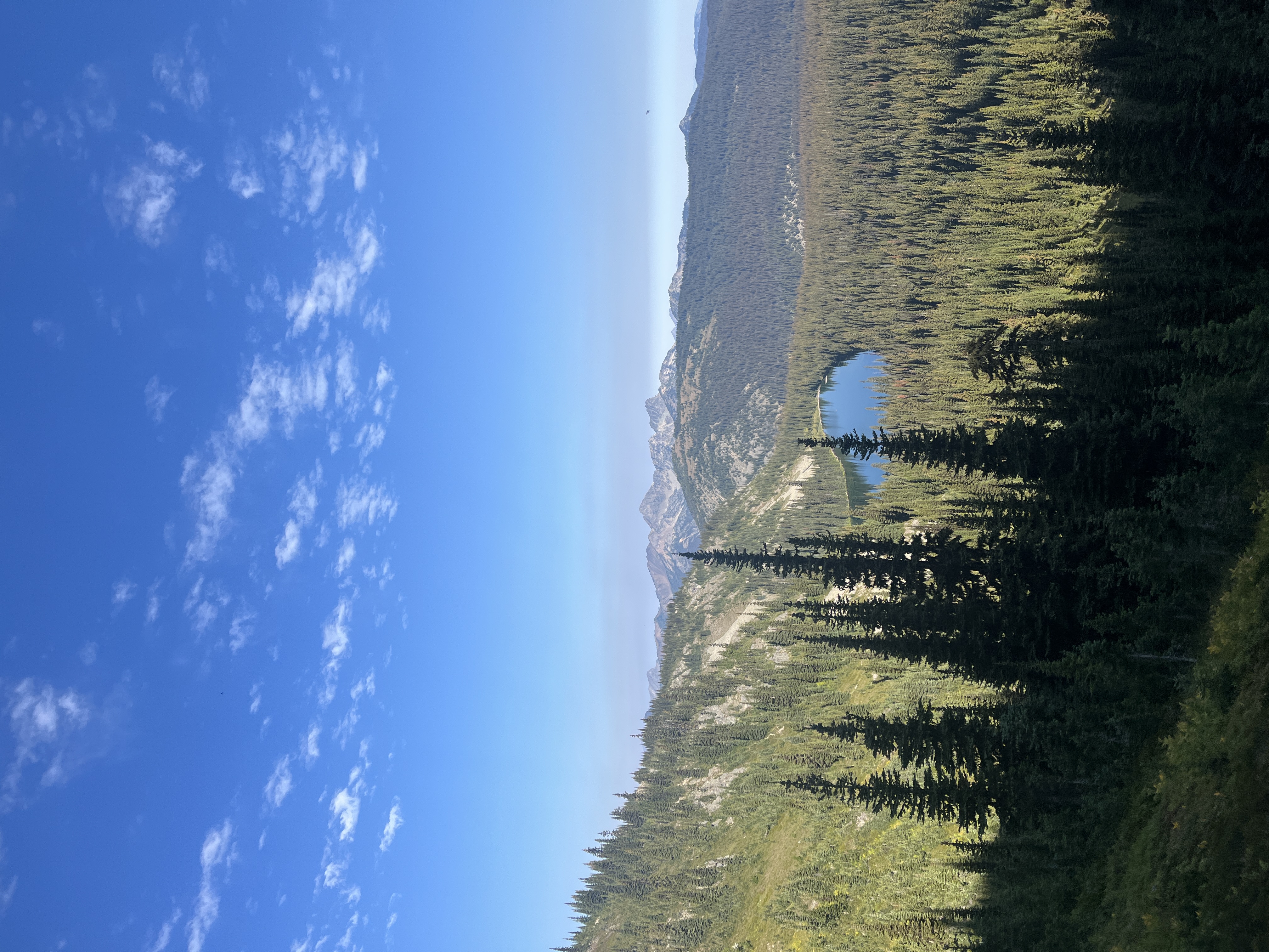 A mountain trail and lake